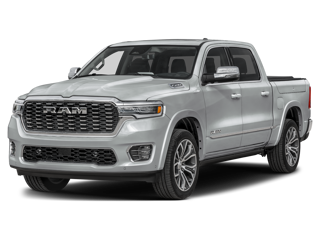 A silver RAM pickup truck with a premium grille on a dark background