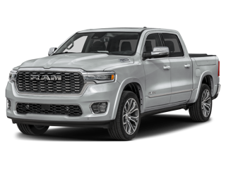 A silver RAM pickup truck with a premium grille on a dark background