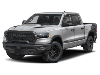 A silver RAM pickup truck with off-road tires on a dark background